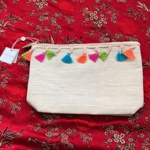 Shiraleah | bag/pouch/clutch Paper straw shell with colorful tassel trim.